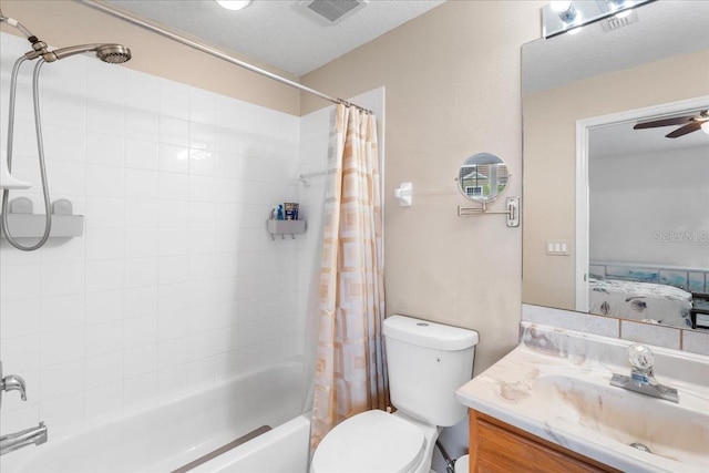 11260 Kapok Grand Cir, Madeira Beach, FL 33708 - full bathroom featuring ceiling fan, vanity, visible vents, toilet, and shower / bath combo with shower curtain