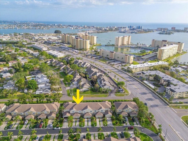 11260 Kapok Grand Cir, Madeira Beach, FL 33708 - bird's eye view featuring a water view and a view of city