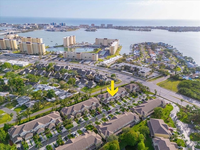 11260 Kapok Grand Cir, Madeira Beach, FL 33708 - drone / aerial view with a view of city and a water view