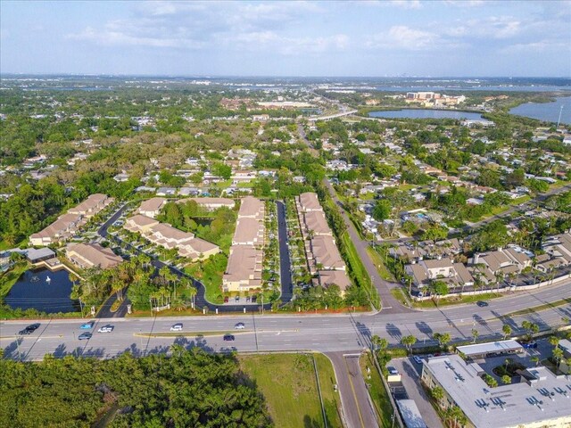 11260 Kapok Grand Cir, Madeira Beach, FL 33708 - drone / aerial view with a water view