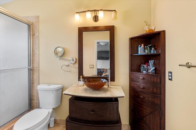 11260 Kapok Grand Cir, Madeira Beach, FL 33708 - bathroom featuring toilet and vanity