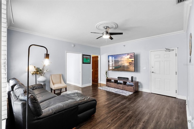 215 Central Ave Unit 4F, Saint Petersburg, FL 33701 - living room featuring dark wood-style flooring, ceiling fan, crown molding, and baseboards