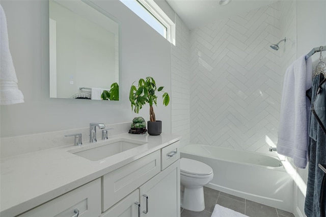 full bathroom featuring vanity, toilet, bathtub / shower combination, and tile patterned floors