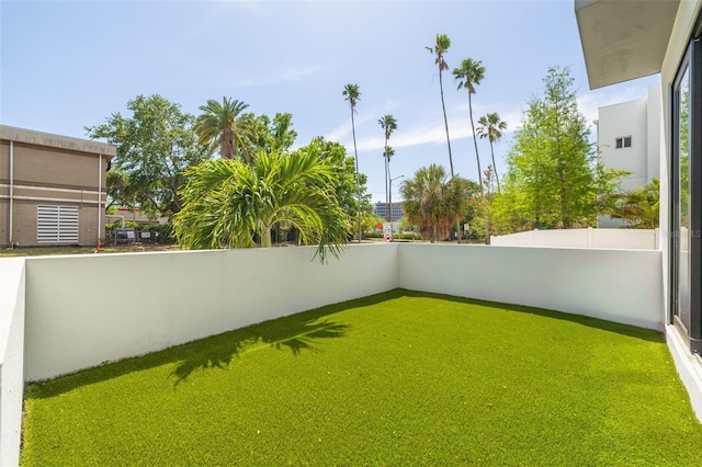 view of yard with fence