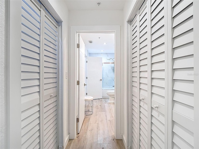 700 S Harbour Island Blvd Unit 143, Tampa, FL 33602 - corridor with visible vents and light wood-style floors
