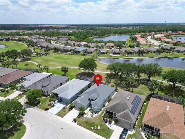1102 Emerald Dunes Dr, Sun City Center, FL 33573 - drone / aerial view with a residential view, view of golf course, and a water view