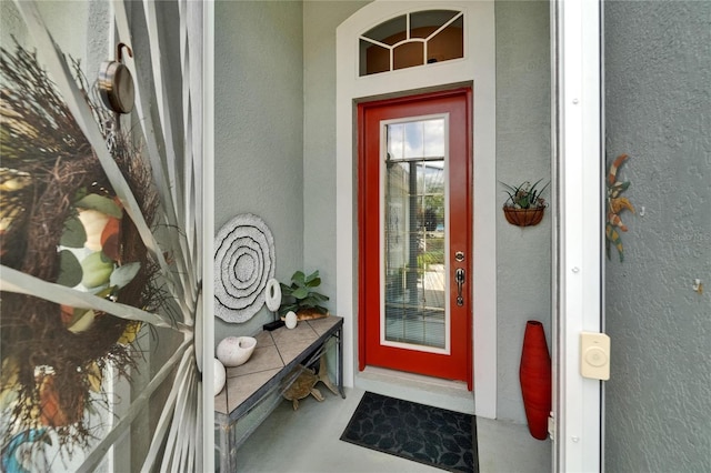 1102 Emerald Dunes Dr, Sun City Center, FL 33573 - entrance to property with stucco siding