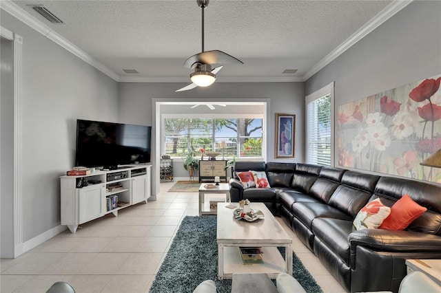 1102 Emerald Dunes Dr, Sun City Center, FL 33573 - living area featuring crown molding, light tile patterned flooring, a ceiling fan, and plenty of natural light