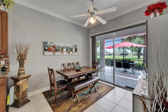 1102 Emerald Dunes Dr, Sun City Center, FL 33573 - dining space with light tile patterned floors, baseboards, ornamental molding, and a ceiling fan