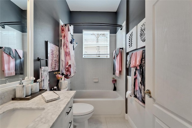 1102 Emerald Dunes Dr, Sun City Center, FL 33573 - full bath featuring toilet, tile patterned floors, bathing tub / shower combination, and vanity