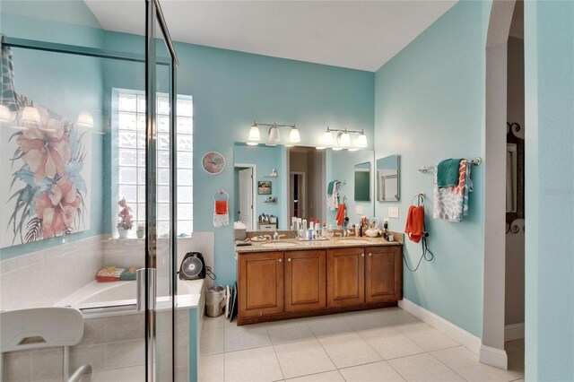 1102 Emerald Dunes Dr, Sun City Center, FL 33573 - full bathroom with a bath, a stall shower, double vanity, and a sink