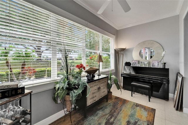 1102 Emerald Dunes Dr, Sun City Center, FL 33573 - living area featuring tile patterned flooring, baseboards, ornamental molding, and ceiling fan