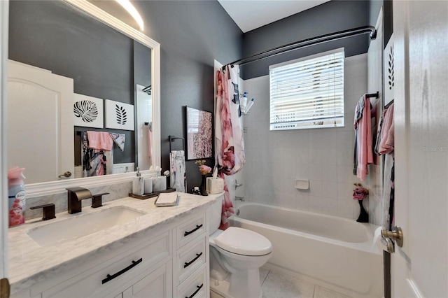 1102 Emerald Dunes Dr, Sun City Center, FL 33573 - bathroom featuring vanity, toilet, tile patterned flooring, and shower / bath combination with curtain