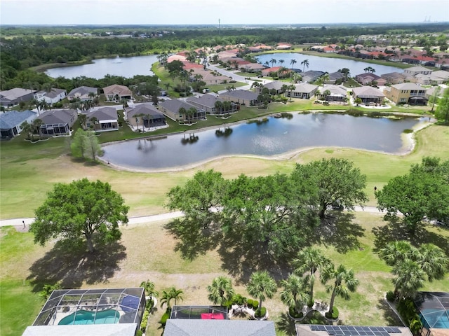 1102 Emerald Dunes Dr, Sun City Center, FL 33573 - drone / aerial view featuring a water view, golf course view, and a residential view
