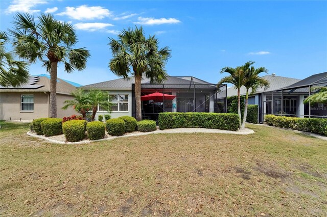 1102 Emerald Dunes Dr, Sun City Center, FL 33573 - view of yard featuring glass enclosure
