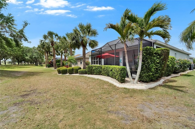 1102 Emerald Dunes Dr, Sun City Center, FL 33573 - view of yard featuring a lanai