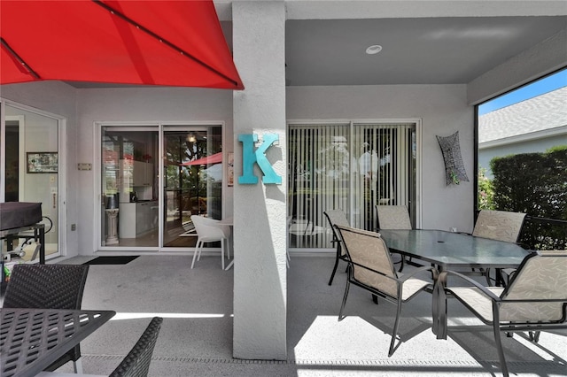 1102 Emerald Dunes Dr, Sun City Center, FL 33573 - view of patio featuring outdoor dining space