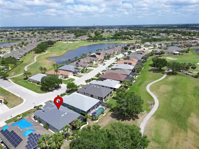 1102 Emerald Dunes Dr, Sun City Center, FL 33573 - birds eye view of property featuring a water view, golf course view, and a residential view