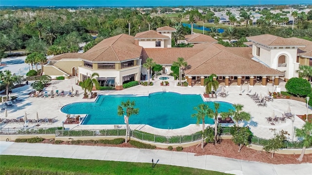 1102 Emerald Dunes Dr, Sun City Center, FL 33573 - pool featuring a patio and fence