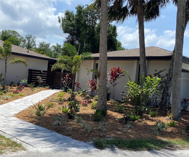 24549 Nova Ln, Punta Gorda, FL 33980 - view of front of home with stucco siding and fence