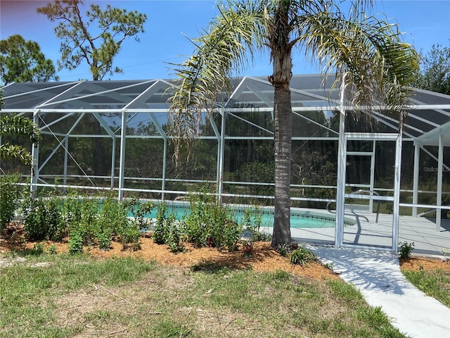 24549 Nova Ln, Punta Gorda, FL 33980 - outdoor pool with glass enclosure