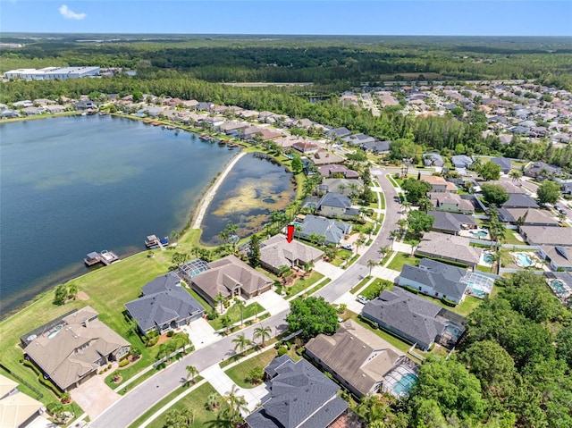 aerial view featuring a residential view and a water view
