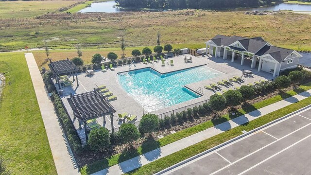 birds eye view of property featuring a water view