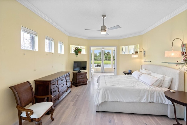 9897 Sago Point Dr, Seminole, FL 33777 - bedroom featuring access to exterior, light wood-style floors, ceiling fan, and ornamental molding