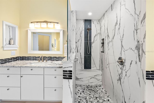 9897 Sago Point Dr, Seminole, FL 33777 - bathroom featuring vanity and a marble finish shower