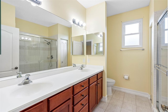 9897 Sago Point Dr, Seminole, FL 33777 - full bathroom featuring double vanity, a sink, and a stall shower