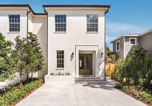 413 W Park Ave Unit 1, Tampa, FL 33602 - view of front of home featuring french doors and stucco siding