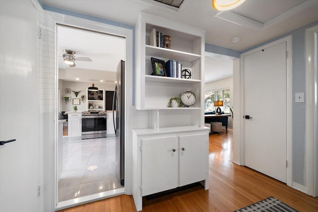 hall featuring light wood-style floors