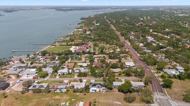 aerial view with a residential view and a water view