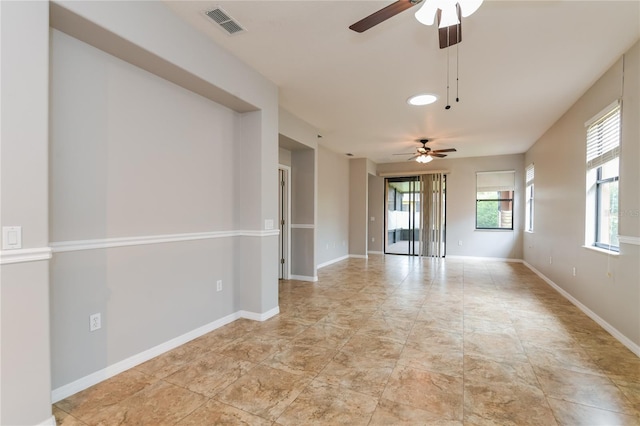 505 Millifiora Ln, Kissimmee, FL 34759 - empty room featuring ceiling fan and baseboards