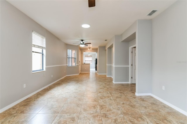 505 Millifiora Ln, Kissimmee, FL 34759 - unfurnished room featuring ceiling fan and baseboards
