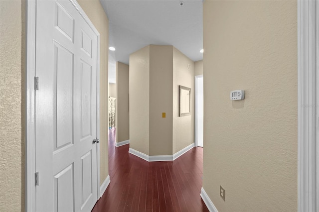 700 S Harbour Island Blvd Unit 813, Tampa, FL 33602 - hall with recessed lighting, a textured wall, baseboards, and dark wood finished floors