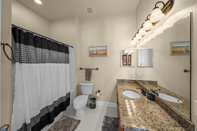 700 S Harbour Island Blvd Unit 813, Tampa, FL 33602 - bathroom featuring tile patterned floors, toilet, vanity, baseboards, and visible vents
