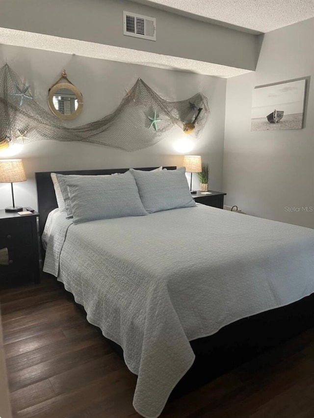 253 Rex Pl Unit B, Madeira Beach, FL 33708 - bedroom with wood finished floors
