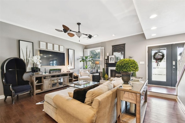 166 E Davis Blvd, Tampa, FL 33606 - living area with ceiling fan, dark wood-type flooring, crown molding, baseboards, and recessed lighting