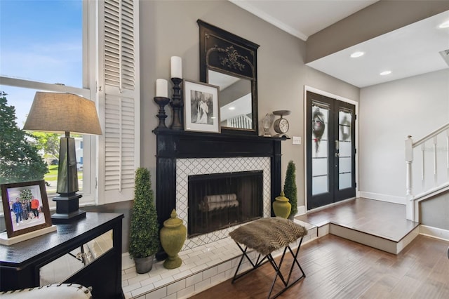 166 E Davis Blvd, Tampa, FL 33606 - living area with wood finished floors, a fireplace, recessed lighting, baseboards, and stairway