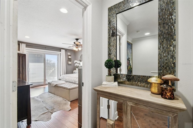 166 E Davis Blvd, Tampa, FL 33606 - bathroom featuring crown molding, wood finished floors, a ceiling fan, vanity, and recessed lighting