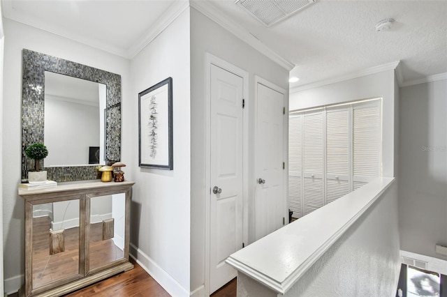 166 E Davis Blvd, Tampa, FL 33606 - hall featuring crown molding, dark wood-style flooring, and baseboards
