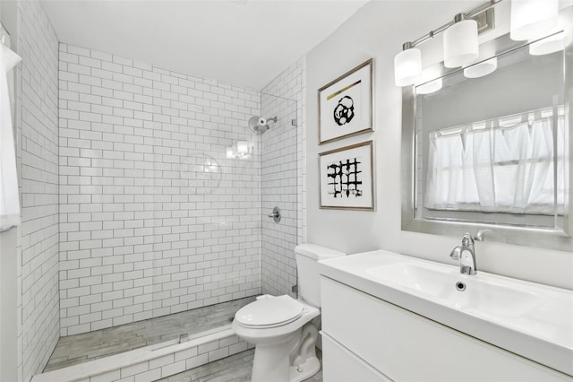 166 E Davis Blvd, Tampa, FL 33606 - full bathroom with toilet, a tile shower, and vanity