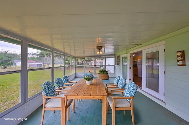 9210 Lehall Sq W, Lakeland, FL 33810 - sunroom featuring plenty of natural light, outdoor dining area, and a ceiling fan