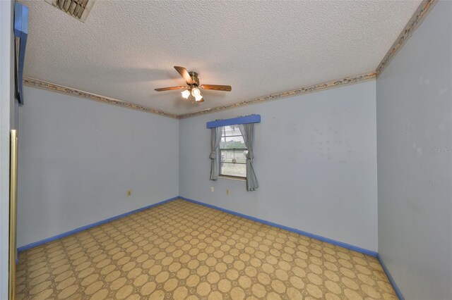 9210 Lehall Sq W, Lakeland, FL 33810 - empty room with ceiling fan, a textured ceiling, and baseboards