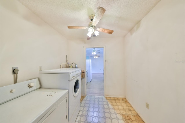 9210 Lehall Sq W, Lakeland, FL 33810 - washroom featuring independent washer and dryer, ceiling fan, light floors, a textured ceiling, and baseboards