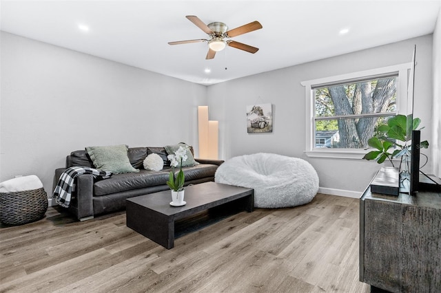 1543 Gentry St, Clearwater, FL 33755 - living room featuring light wood-style floors, recessed lighting, baseboards, and ceiling fan