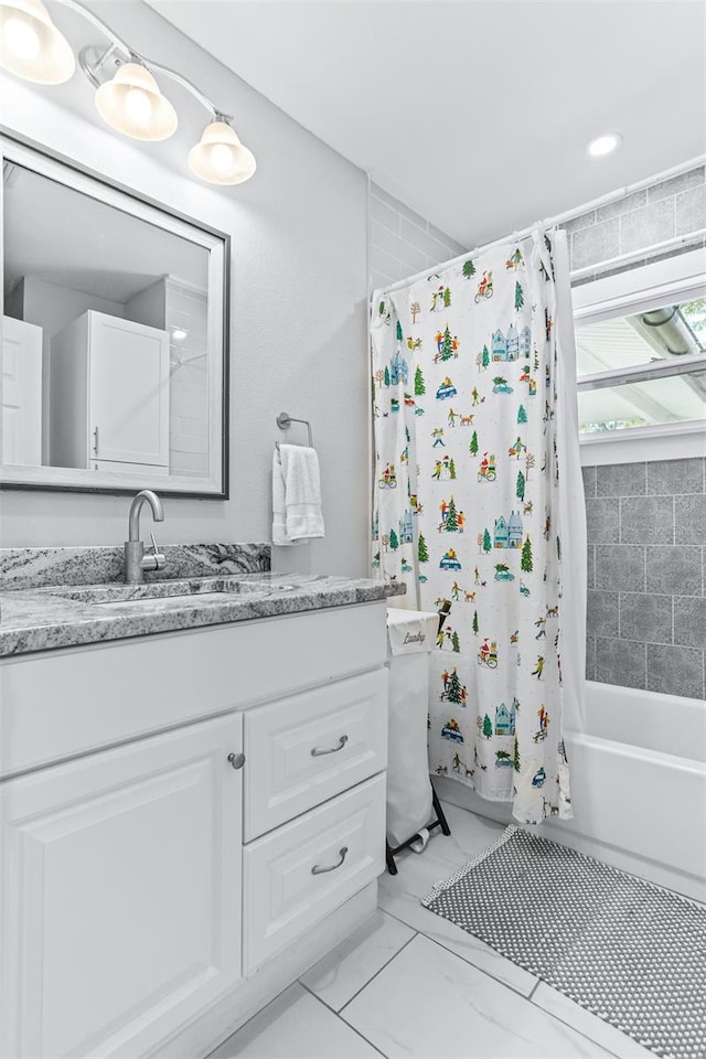 1543 Gentry St, Clearwater, FL 33755 - bathroom with vanity, marble finish floor, and shower / tub combo with curtain