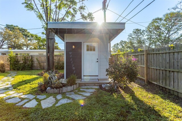 1543 Gentry St, Clearwater, FL 33755 - view of outdoor structure with a fenced backyard and an outdoor structure