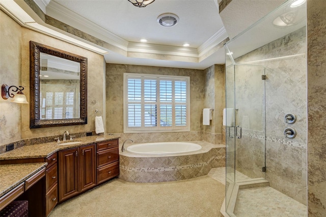 full bath with vanity, crown molding, a garden tub, and a shower stall